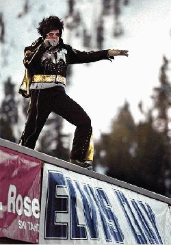 Mike Pierce, marketing diretor at Mt. Rose/Ski Tahoe, greets skiers Saturday on Elvis Ski Day. - Scott Sady/RGJ